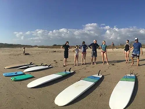 Ready to surf group surf lessons guiones