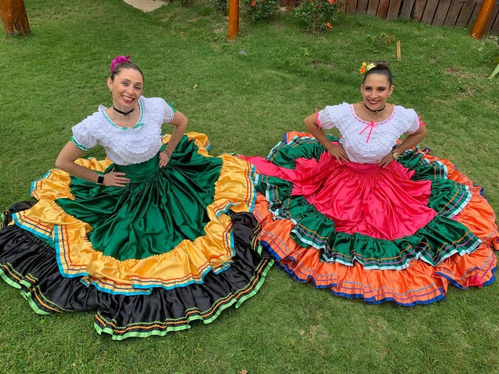Nelsy (on the left) with co-worker Estefanía during Guancaste Day Celebrations back in the days intercultura costa rica success story nelsy
